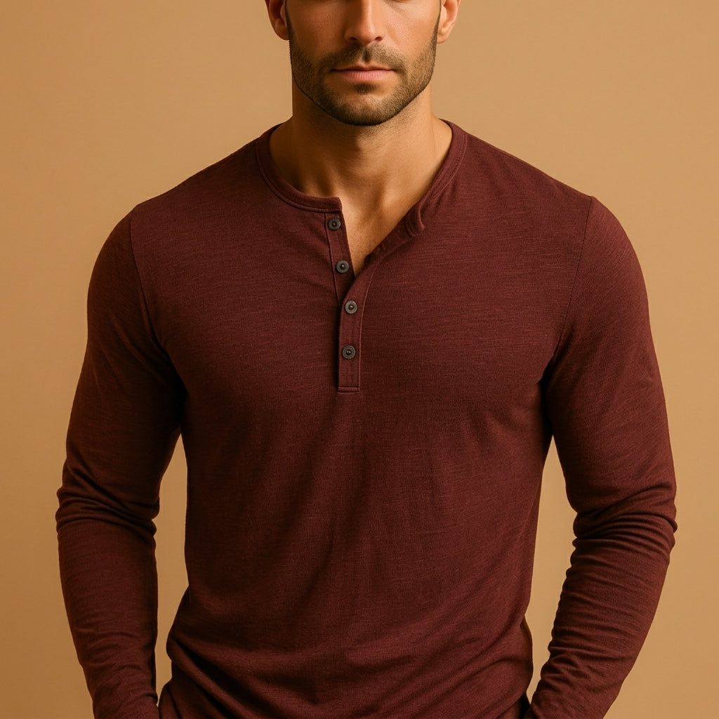 Henley worn with jeans, showing the slim fit through the body