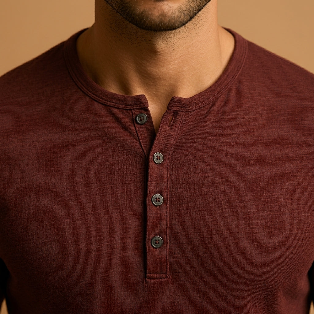 Close-up of the henley button placket at the neck