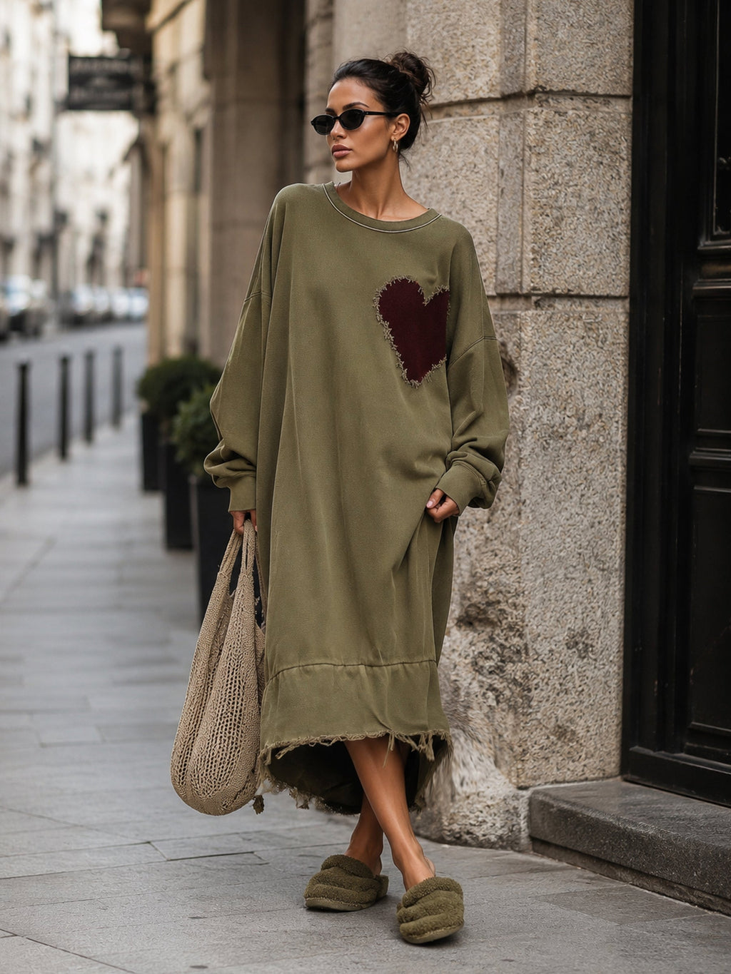 Distressed burgundy heart patch on the front of the olive dress