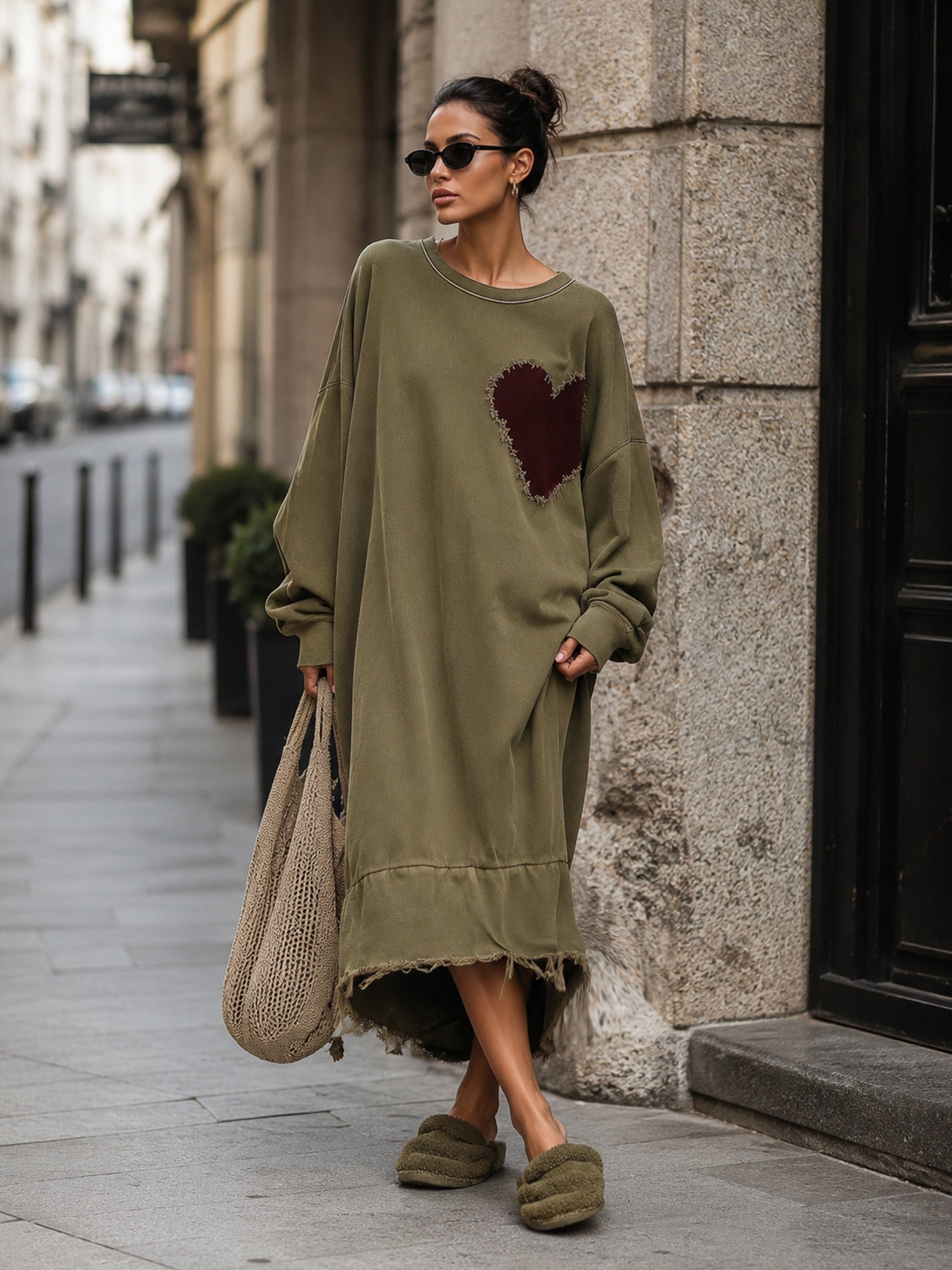 Distressed burgundy heart patch on the front of the olive dress