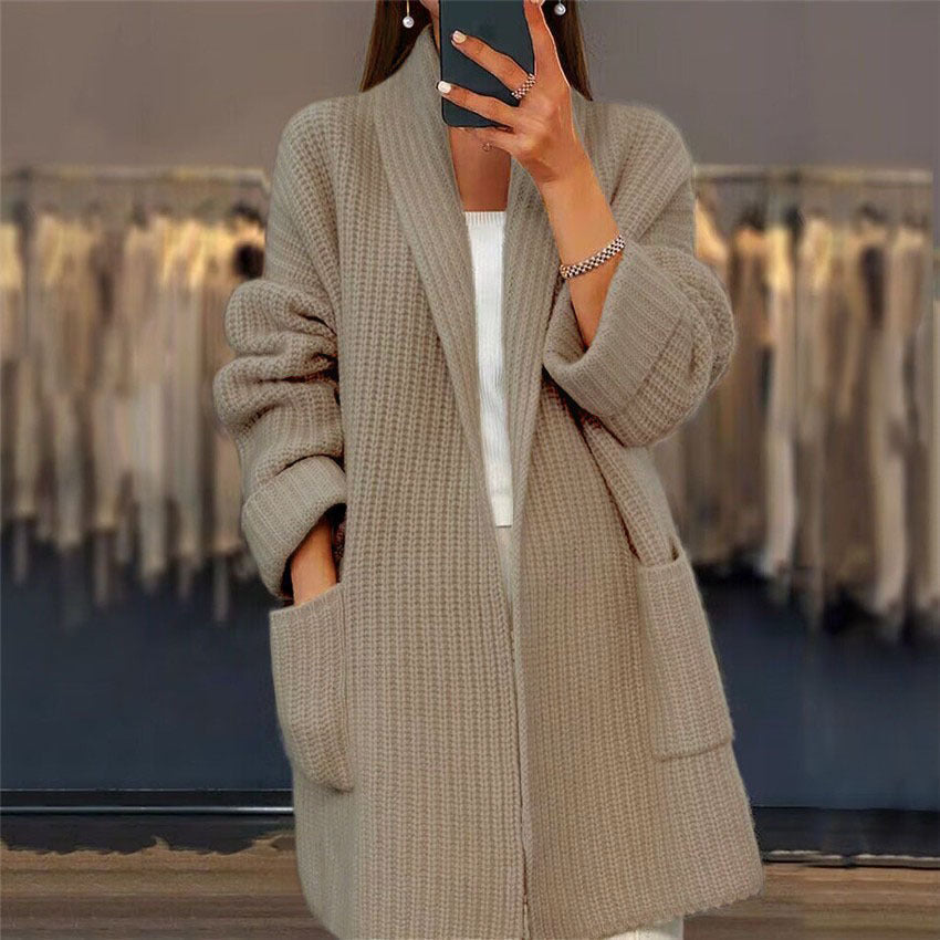Camel beige knit cardigan showing the folded collar and soft fluffy yarn