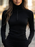 Black ribbed turtleneck top for women, front view with the half zip closed