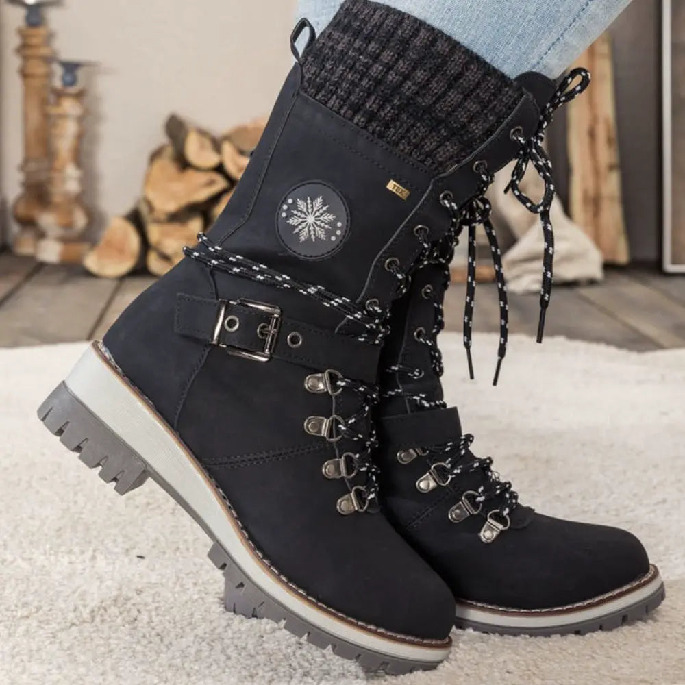 Orthopedic winter boots for women in black, side view