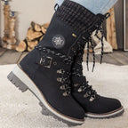 Orthopedic winter boots for women in black, side view