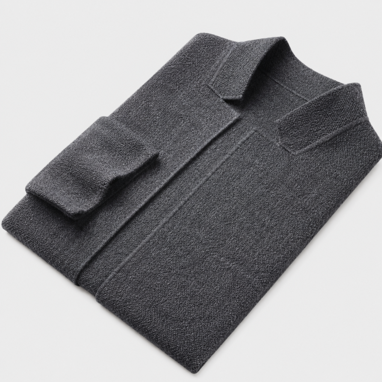 Cardigan worn closed over a tee, showing the slim fit