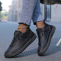 Close view of the elastic side panels on the slip on orthopedic sneaker
