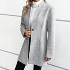 Gray longline coat for women showing notch lapels and single button closure