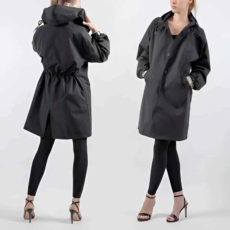 Hooded raincoat shown in a beige colorway, full length