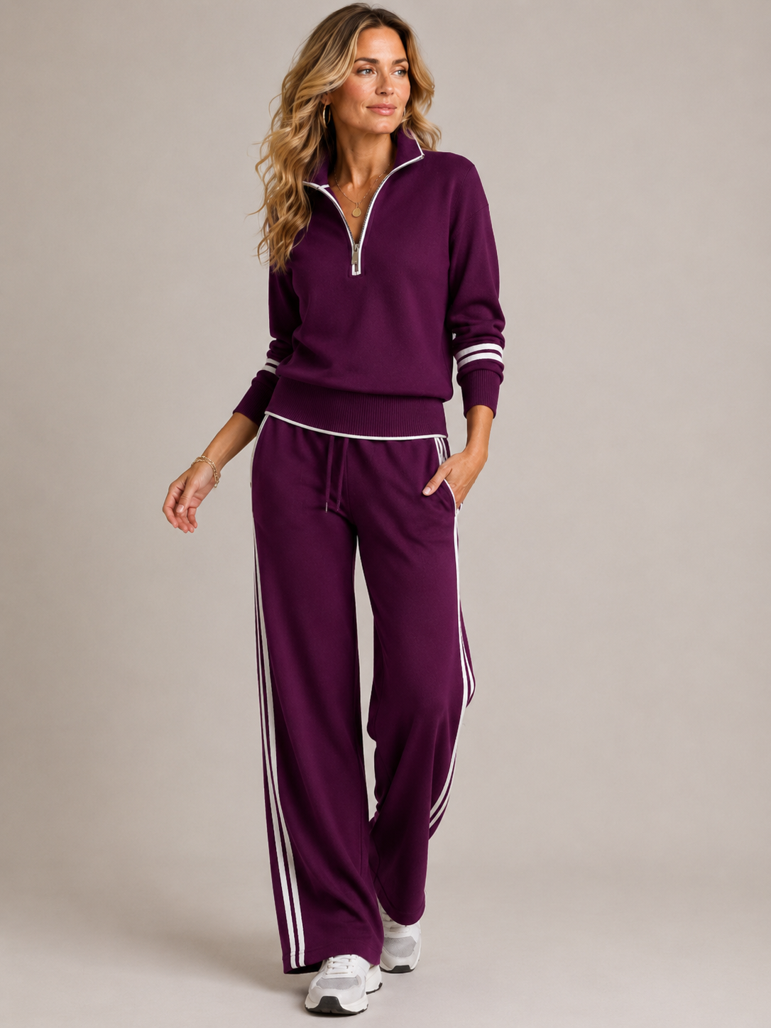 Knit matching set for women, close view of the quarter zip collar and striped trim