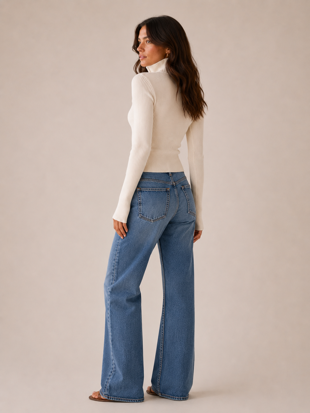 Ribbed knit cardigan shown with the lower zip opened at the hem