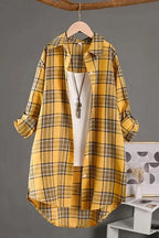 Plaid flannel shirt for women, side view showing the curved hem and cuffs