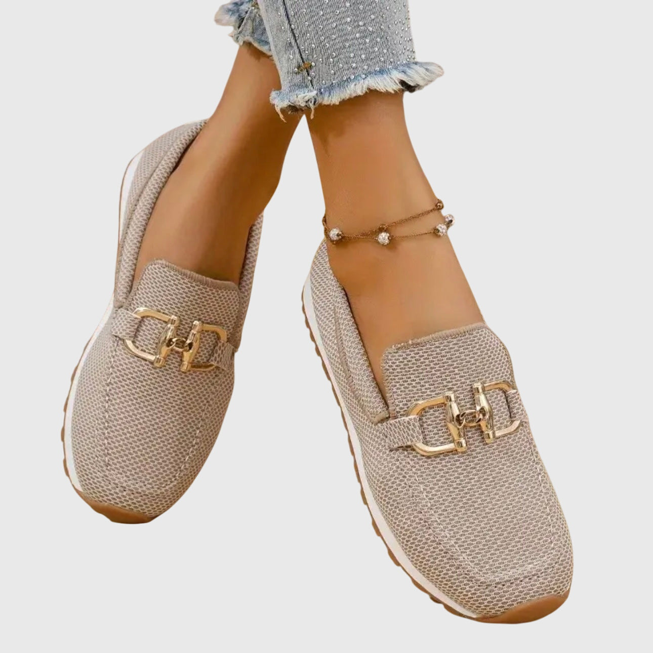 Blue womens loafers worn with cropped jeans