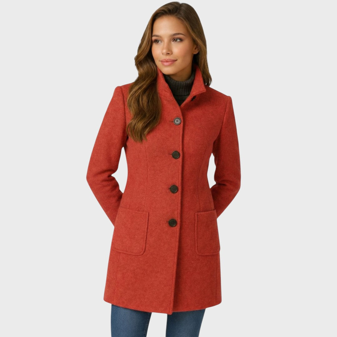 Tailored long coat for women shown in a light cream colorway
