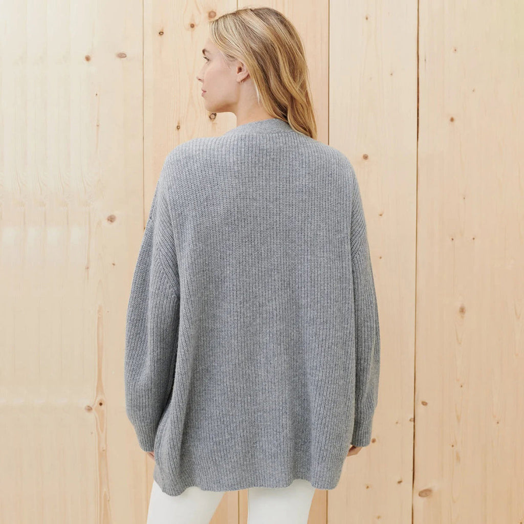 Heather grey cashmere cardigan, side view on model