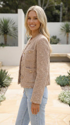 Women's cropped jacket in beige seen from the side