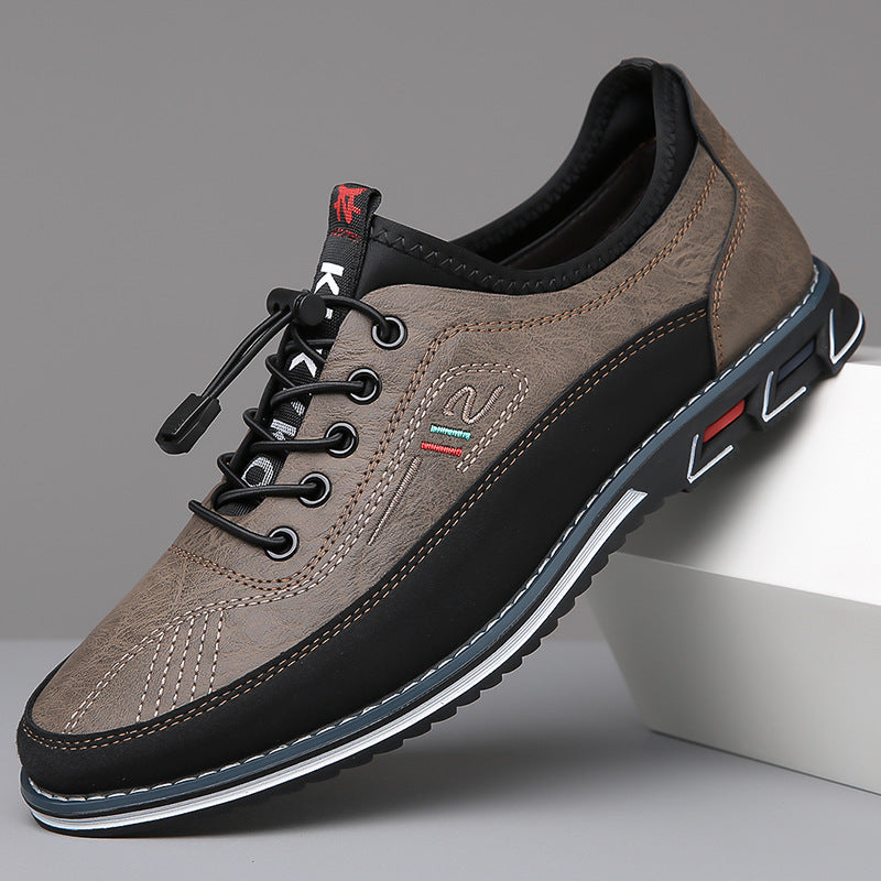 Charcoal gray mens dress shoes worn with chinos