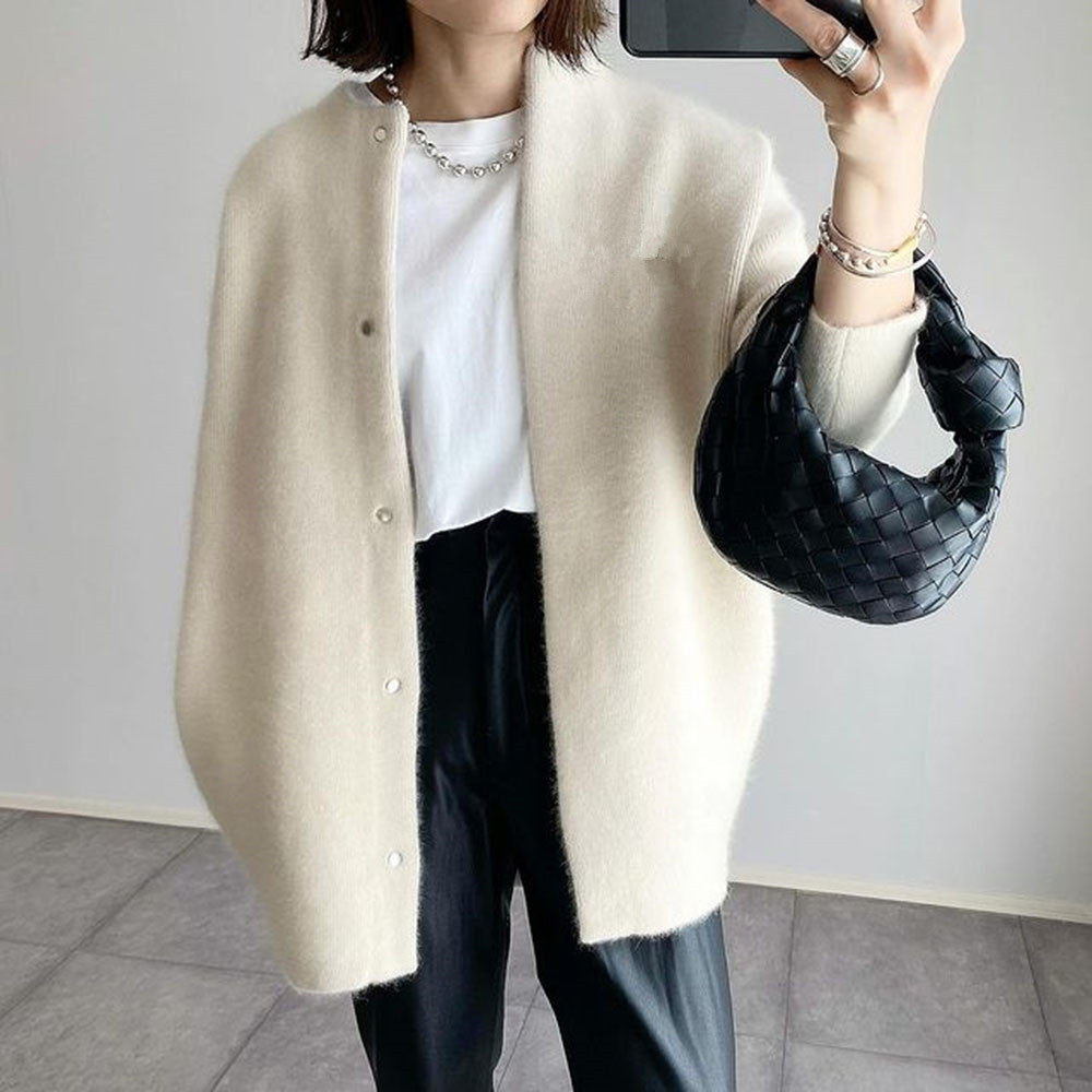 Soft knit cardigan worn open over a plain tee