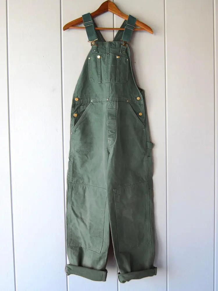 Wide leg overalls for women, back view showing the strap crossing