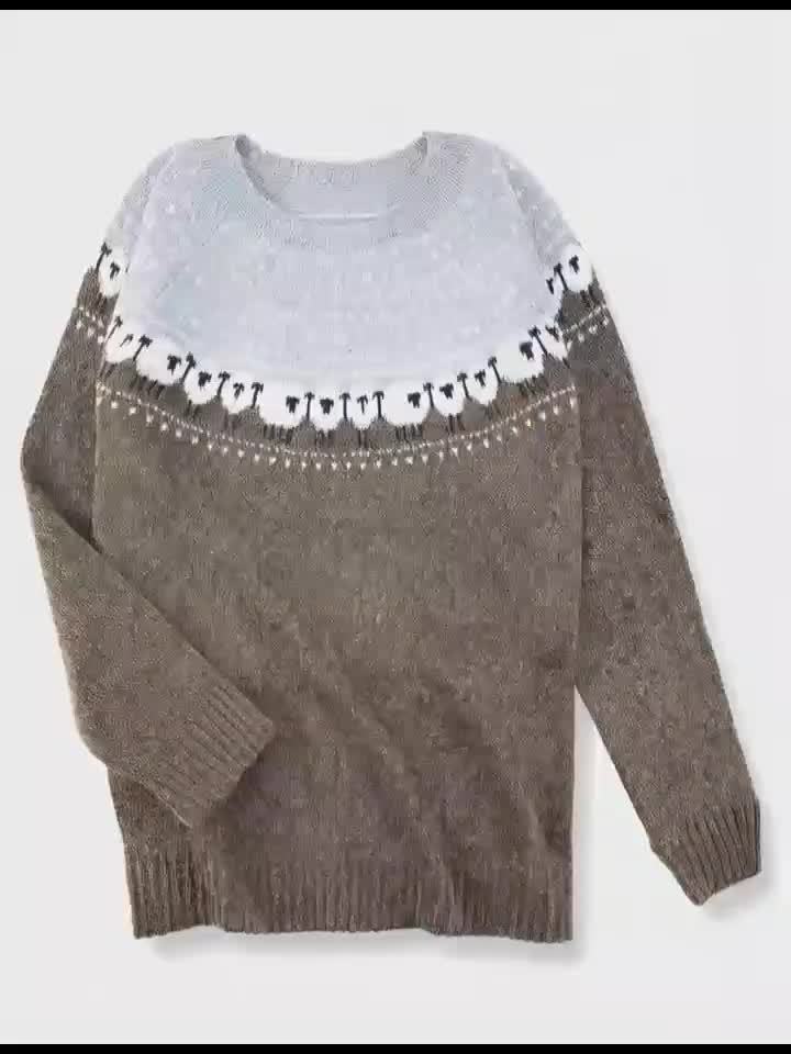 Gray Nordic sheep sweater laid flat showing the full pattern