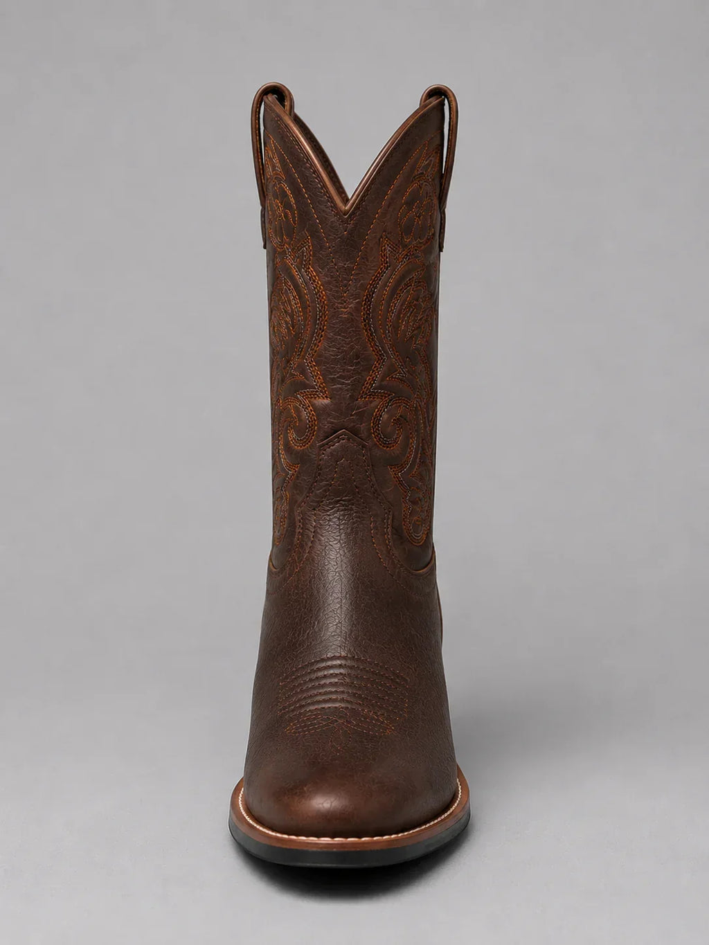 Brown leather western boots for women, stacked block heel close up