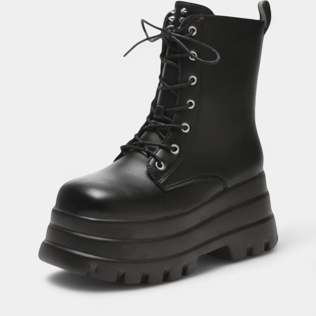 Platform combat boot side view showing the tall lug sole