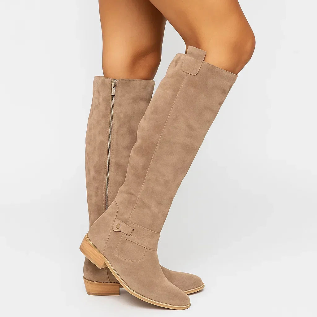 Knee high suede boots for women in beige, pair shown standing