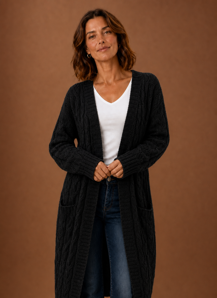 Hooded cable knit cardigan in black, front view with patch pockets