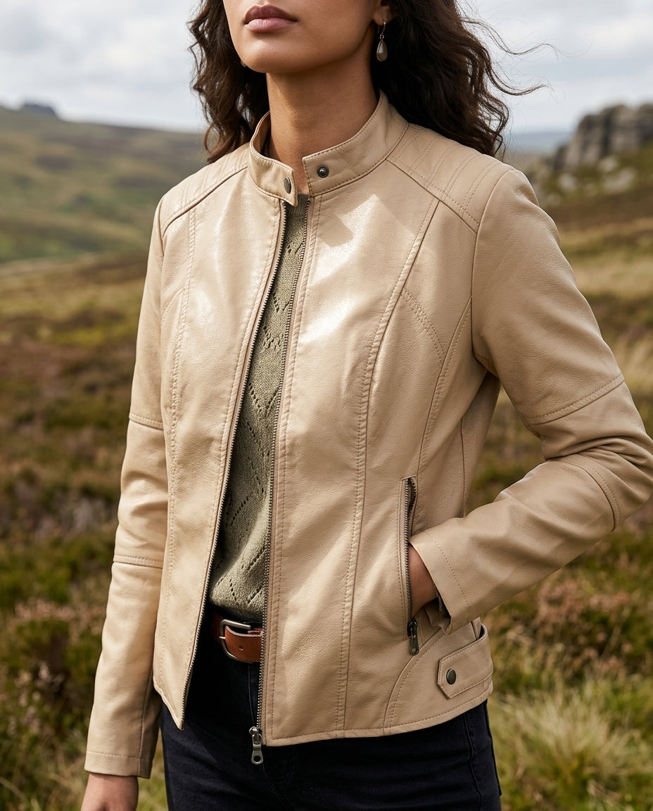 Womens cropped moto jacket showing the funnel neck collar zipped up