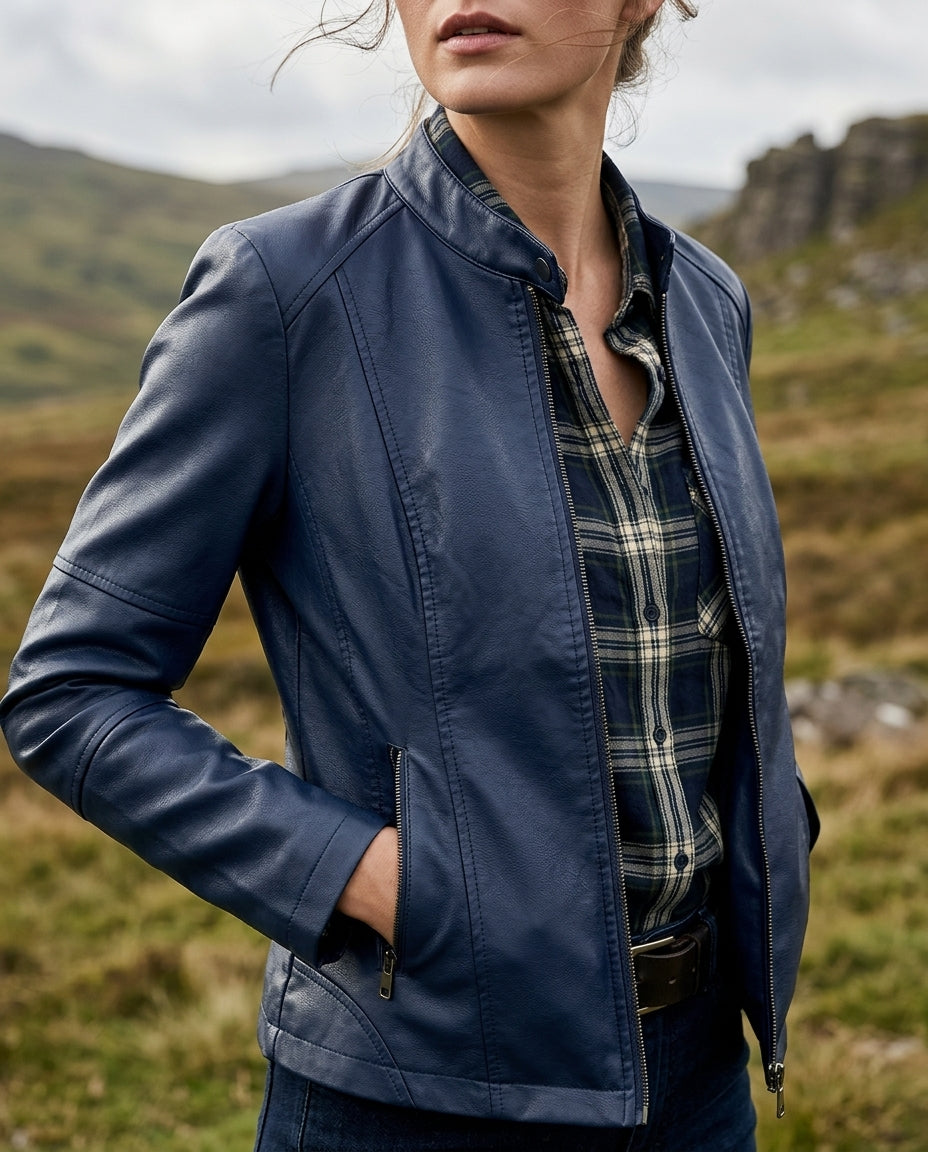 Side zip detail at the hip on a cropped faux leather jacket