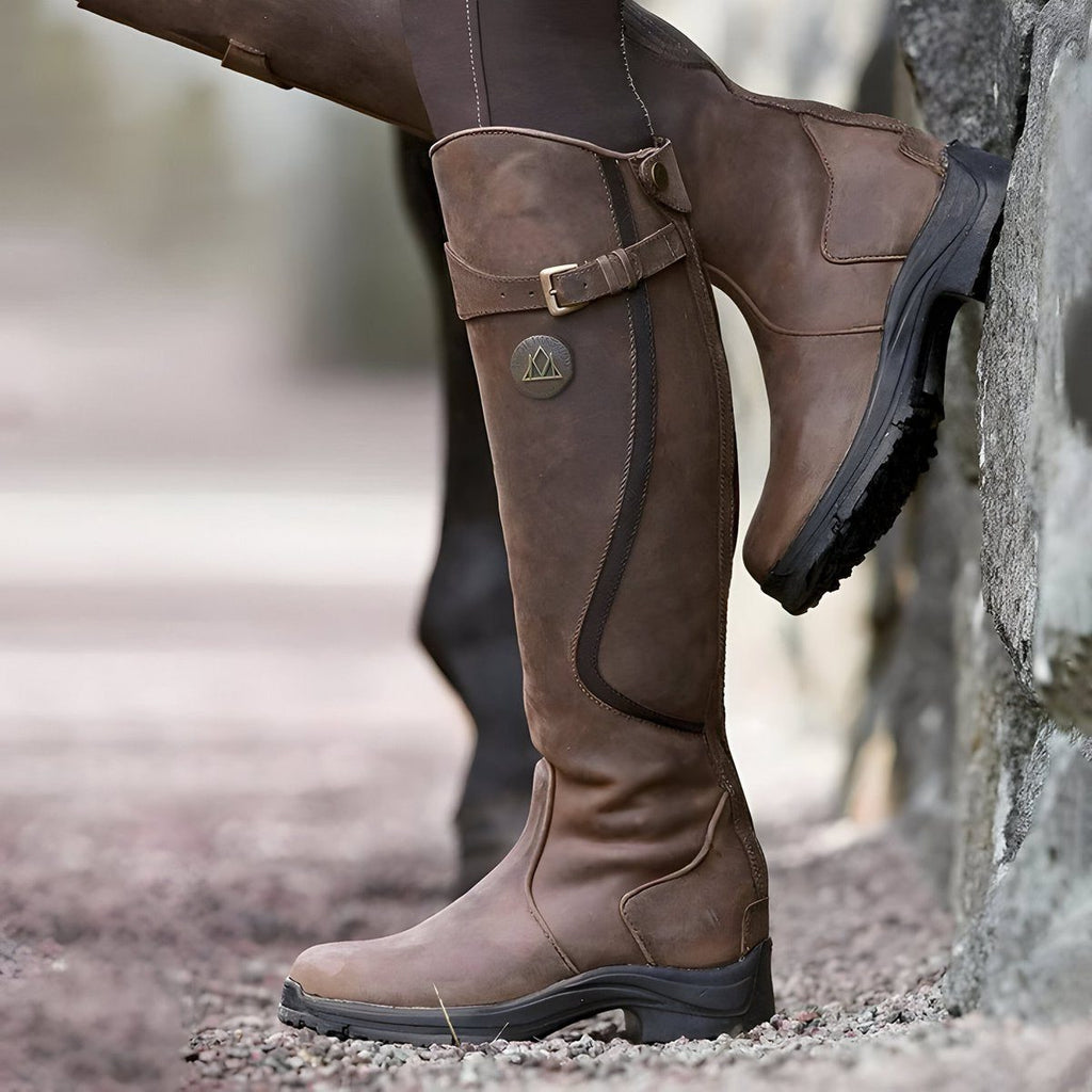 Knee high leather boots for women, pair shown side by side