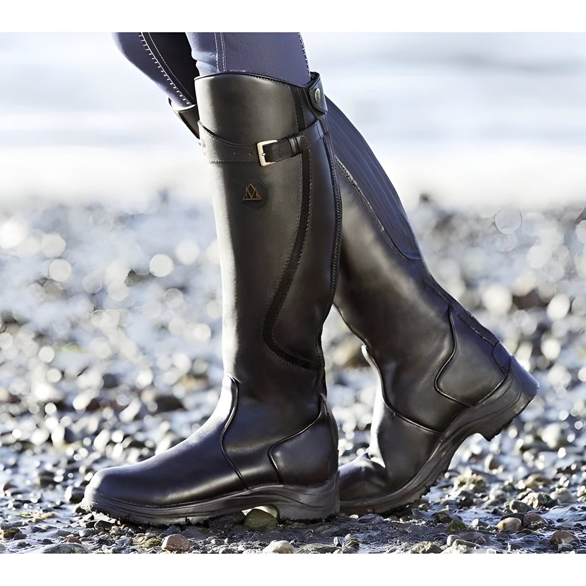 Side profile of the tall leather boot showing the shaft height