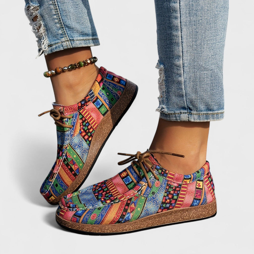 Sole and low profile detail of the women's orthopedic walking shoe