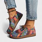 Sole and low profile detail of the women's orthopedic walking shoe
