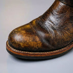 Detail of the aged leather grain and slip-resistant grip outsole