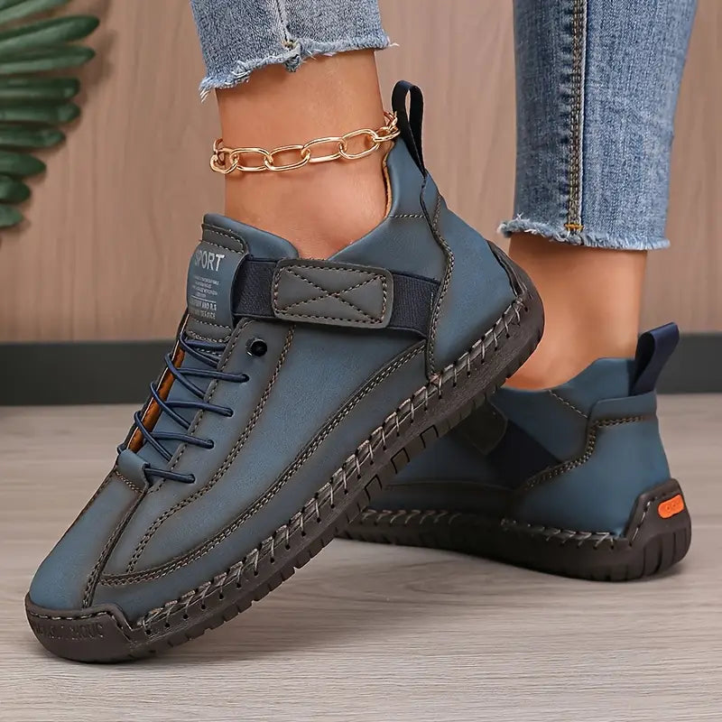 Orthopedic shoes for women in dark blue, side profile