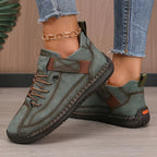 Orthopedic slip on sneakers for women in a deep green colorway