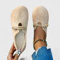 Comfortable orthopedic loafers for women, side view of the low slip-on shape