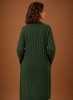 Back of the green hooded cardigan showing the attached hood