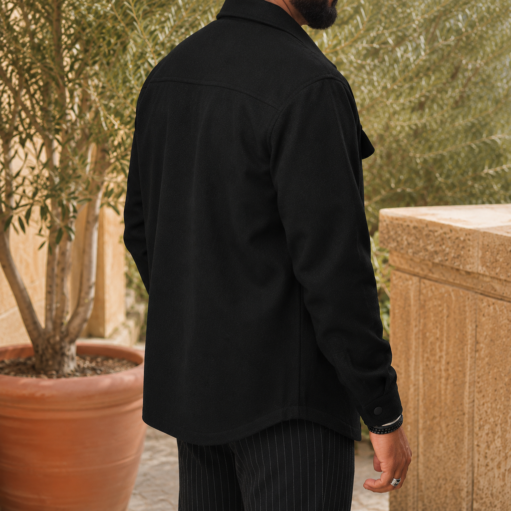 Men's snap front utility jacket buttoned, showing the spread collar