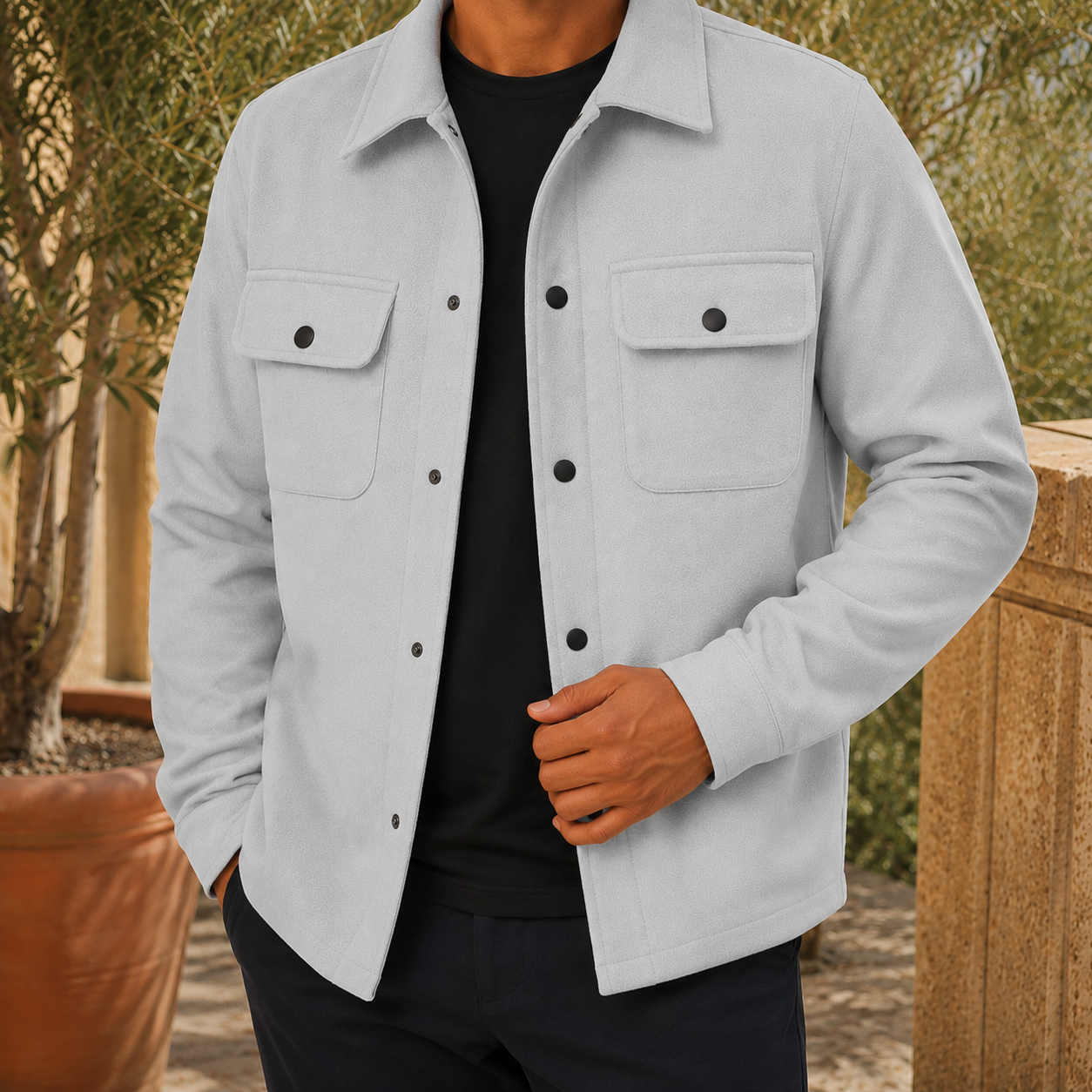 Close-up of the snap buttons on the men's utility jacket front