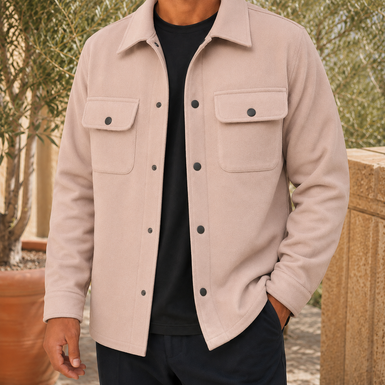 Men's soft woven utility jacket laid flat to show the cut
