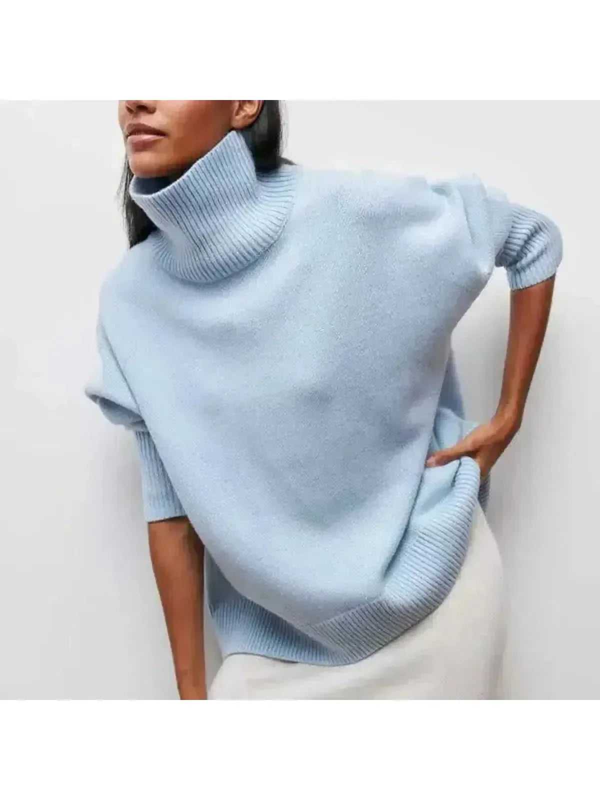 Oversized turtleneck sweater in blue worn front-on