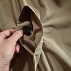 Three-quarter angle view of the men's windproof coat