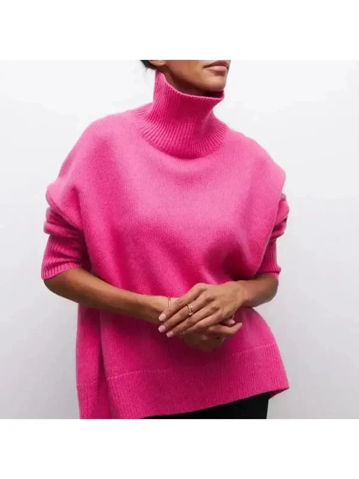 Wide elbow-length short sleeve detail on the oversized sweater