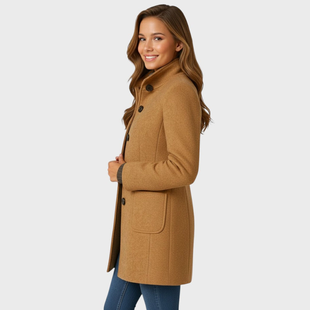 Tailored long coat for women worn open over a sweater, side view