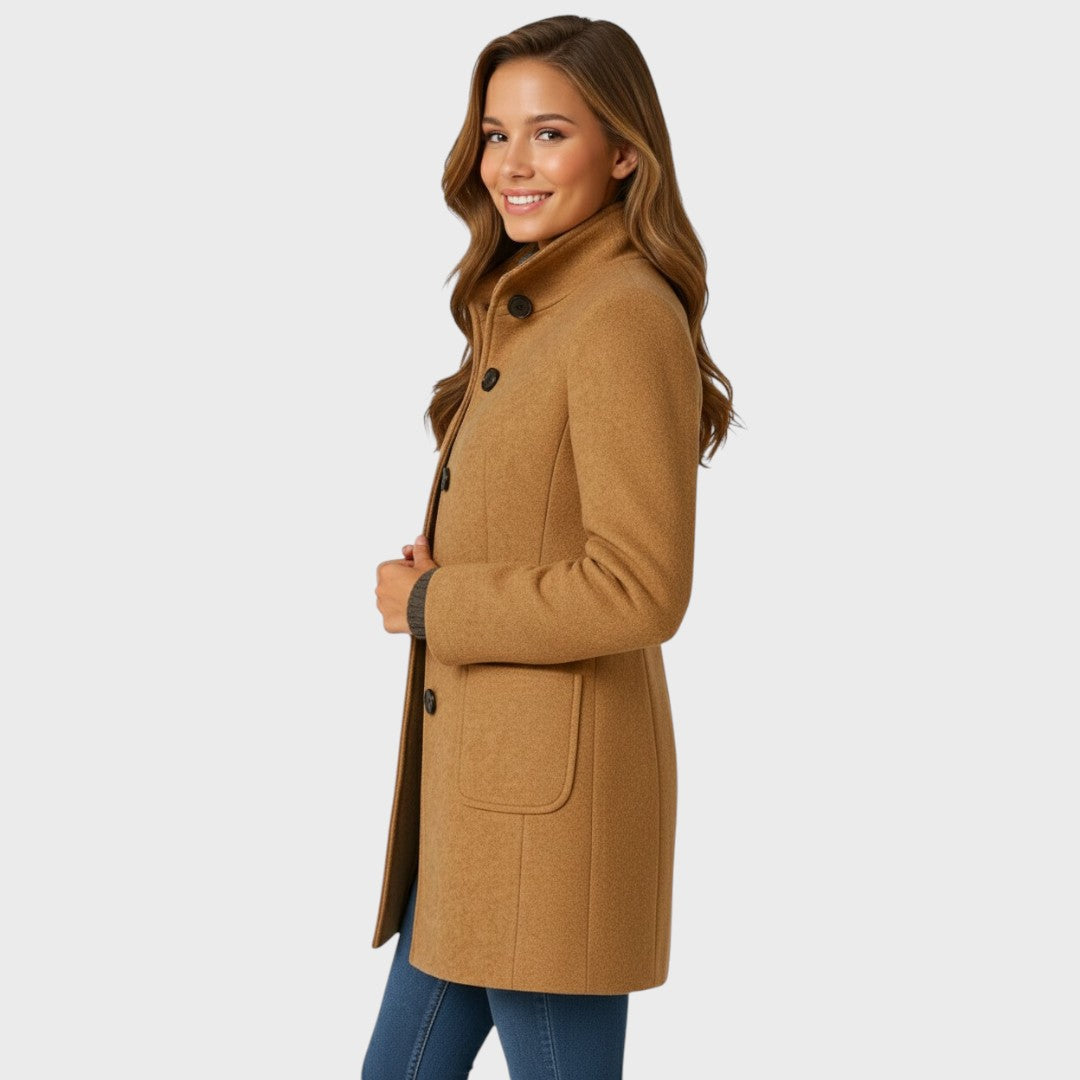 Tailored long coat for women worn open over a sweater, side view