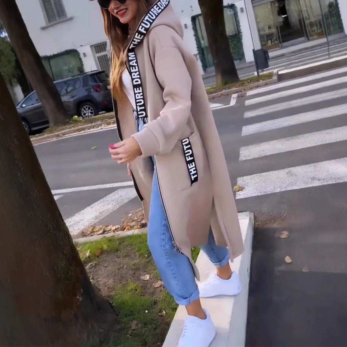 Duster coat in brown, side view showing the long straight line