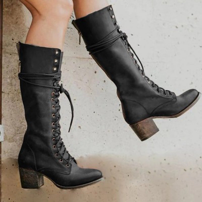 Close-up of the side zipper and ankle strap on the combat boot