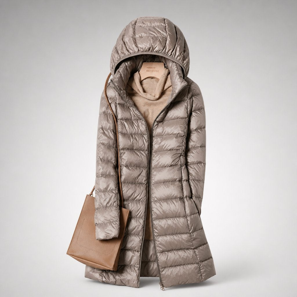 Lightweight down puffer jacket for women, back view of the longline cut