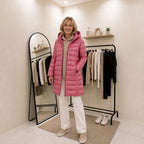 Lightweight down puffer jacket for women, front view zipped to the neck